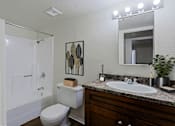Thumbnail 3 of 27 - Bathroom with Tub at Sahuaro West Apartments, Phoenix, Arizona
