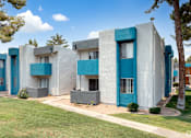 Thumbnail 3 of 15 - A row of modern style houses with blue trim.