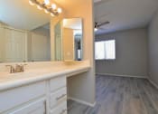 Thumbnail 8 of 9 - a bathroom with a sink and a mirror