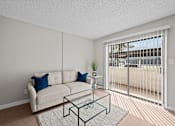 Thumbnail 3 of 28 - A living room with a white couch and a glass coffee table  at Tides on McDowell, Phoenix