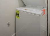 Thumbnail 6 of 32 - a washer and dryer in the laundry room of an apartment