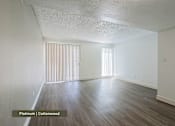 Thumbnail 18 of 51 - A room with platinum and cottonwood flooring.