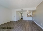 Thumbnail 17 of 51 - A room with platinum colored hardwood flooring.