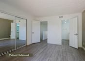 Thumbnail 12 of 51 - A room with platinum and cottonwood flooring.