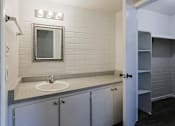 Thumbnail 13 of 30 - Bathroom with granite countertop at The Link Apartments, Arizona, 85201