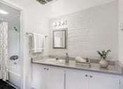 Thumbnail 12 of 30 - Bathroom with sink at The Link Apartments, Mesa, 85201