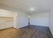 Thumbnail 10 of 30 - Unfurnished room with wooden floorings at The Link Apartments, Mesa, AZ
