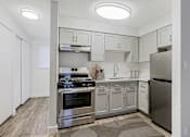Thumbnail 1 of 30 - Kitchen with stainless steel appliances at The Link Apartments, Mesa, AZ, 85201