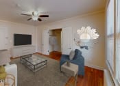 Thumbnail 6 of 12 - living area with sofa, coffee table, credenza, tv, and hardwood floors at 2801 Pennsylvania apartments in washington dc