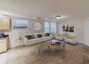 Thumbnail 12 of 15 - living area with large windows, sofa, coffee table, hardwood floors and view of kitchen at 1818 riggs apartments in washington dc