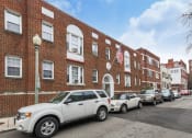 Thumbnail 15 of 15 - exterior of brick apartments at 1818 riggs place washington dc