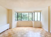 Thumbnail 23 of 39 - vacant living area with large windows at twin oaks apartments columbia heights washington dc