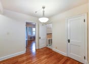 Thumbnail 25 of 27 - hallway view of living area, bathroom and bedroom at  2629 39th Street apartments in washington dc