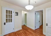 Thumbnail 15 of 27 - hallway with view of bedroom, sunroom and living area  at  2629 39th Street apartments in washington dc