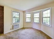 Thumbnail 19 of 27 - vacant sunroom with bay windows  at  2629 39th Street apartments in washington dc