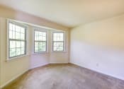 Thumbnail 18 of 27 - vacant sunroom with bay windows  at  2629 39th Street apartments in washington dc