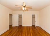 Thumbnail 14 of 26 - vacant bedroom with hardwood flooring and large closets at 2701 Connecticut apartments in washington dc
