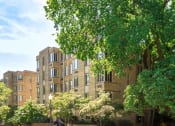 Thumbnail 2 of 40 - stone exterior of 2800 woodley apartments in washington dc