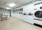 Thumbnail 29 of 40 - laundry room at 2800 woodley road apartments in washington dc
