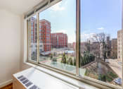 Thumbnail 8 of 40 - living area view from large window at 2800 woodley road apartments in woodley park washington dc