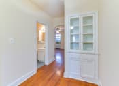 Thumbnail 7 of 16 - hallway with built in shelving at 4020 calvert street apartments in washington dc