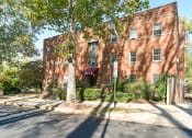 Thumbnail 1 of 18 - exterior of brick apartment building at 4031 davis place in washington dc
