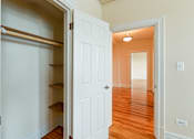 Thumbnail 8 of 26 - large closet with shelving and  view of hallway at  2701 Connecticut apartments in washington dc