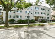 Thumbnail 1 of 18 - exterior of stone apartment building at 734 longfellow street apartments in washington dc