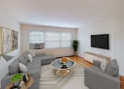 Thumbnail 3 of 16 - living area with sofa, coffee table, credenza, tv, large windows and hardwood floors at alpha house apartments in washington dc
