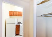 Thumbnail 5 of 20 - hallway view of kitchen and closet at baystate apartments in washington dc