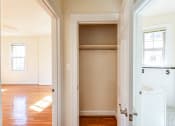 Thumbnail 25 of 29 - hallway view of closet, living area and bathroom at the frontenac apartments in van ness washington dc