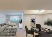 Thumbnail 6 of 23 - living area with sofa, coffee table, large windows, and views of kitchen and dining areas at cambridge square apartments in bethesda md