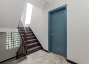 Thumbnail 15 of 17 - unit entrance to 1400 van buren apartments with staircase nearby