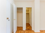 Thumbnail 26 of 47 - large closets with shelving and hardwood floors at brunswick house apartments in dupont circle washington dc