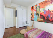Thumbnail 13 of 25 - small bedroom with bed, dresser, desk and window at fairway park apartments in washington dc