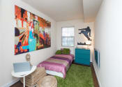 Thumbnail 12 of 25 - small bedroom with bed, dresser, desk and window at fairway park apartments in washington dc