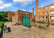 Thumbnail 16 of 25 - playground with jungle gym at fairway park apartments in washington dc