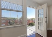 Thumbnail 9 of 21 - balcony with french doors at juniper courts apartments in takoma washington dc