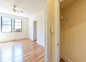 Thumbnail 9 of 28 - large closet with view of living area at the klingle apartments in washignton dc