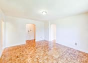 Thumbnail 5 of 17 - vacant living area with hardwood floors at randle circle apartments in washington dc