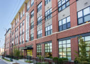 Thumbnail 1 of 6 - exterior of brick apartment building at sheridan station in washington dc