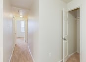 Thumbnail 10 of 17 - hallway view of bedroom and closet at the whitelaw apartments in washington dc