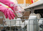 Thumbnail 16 of 17 - A person in pink gloves is loading dishes into a dishwasher.