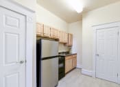 Thumbnail 11 of 35 - kitchen with stainless steel appliances at dupont apartments in washington dc