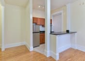 Thumbnail 13 of 35 - view of kitchen with stainless steel appliances and breakfast bar at dupont apartments in washington dc