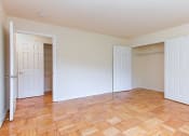 Thumbnail 15 of 19 - bedroom with wood flooring at fort totten apartments in washington dc