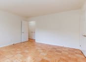 Thumbnail 14 of 19 - bedroom with wood flooring at fort totten apartments in washington dc