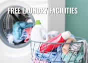 Thumbnail 21 of 22 - A laundry basket filled with clothes and laundry products in front of a washing machine.