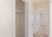 Thumbnail 7 of 16 - hallway view of bedroom and closet at grandview village apartments in shipley terrace washington dc