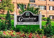 Thumbnail 1 of 16 - monument sign at grandview village apartments in shipley terrace washington dc